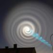 Another spiral “UFO” lights up the sky. And it IS a spaceship.